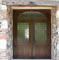 wrought iron and wood front door
